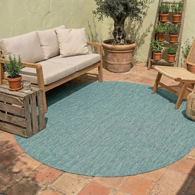 NATURL. Rond buitenkleed - Costa Turquoise | Zomerse budgettopper! - Ø 120cm