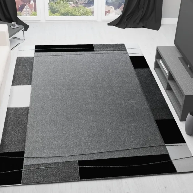 Unyqoos Stijlvol modern tapijt in grijstinten met handgesneden contouren en motief