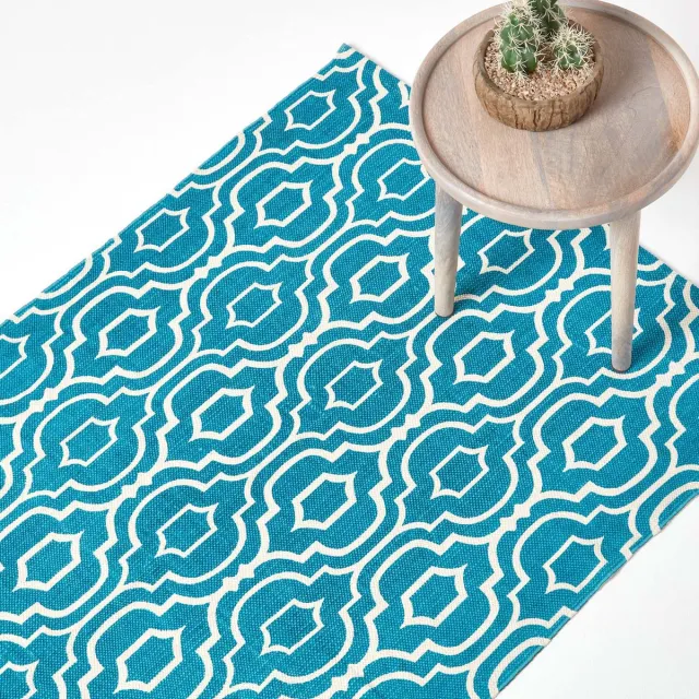 Homescapes Riga bedrukt katoenen vloerkleed met blauw en wit patroon, 120 x 170 cm
