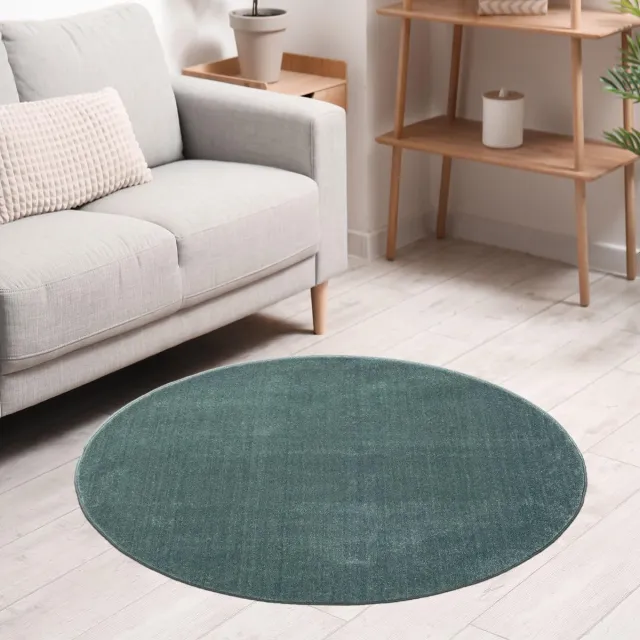 Unyqoos Rond laagpolig vloerkleed in turquoise voor woonkamer en slaapkamer