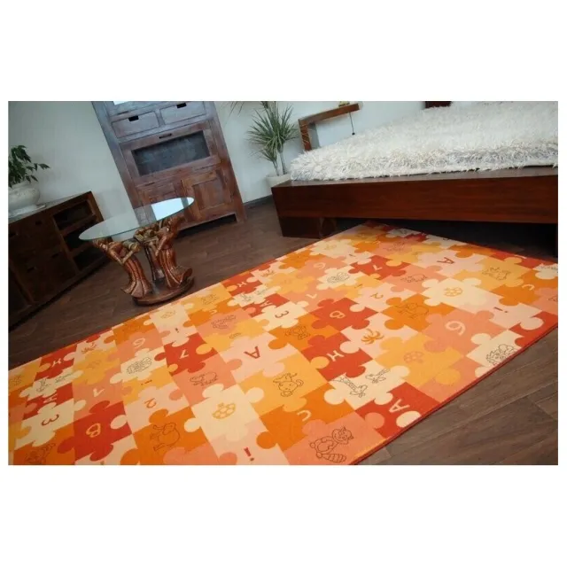 RUGSX Kleden Rugsx Kindertapijt PUZZLE oranje 100x150 cm