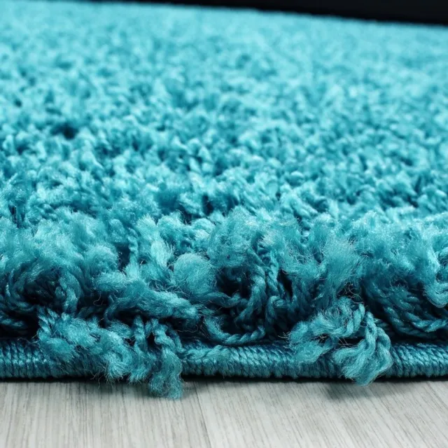 flycarpets Hoogpolig vloerkleed, effen kleur - turquoise, woonkamerkleed, jute achterkant, afmeting: 200 cm rond