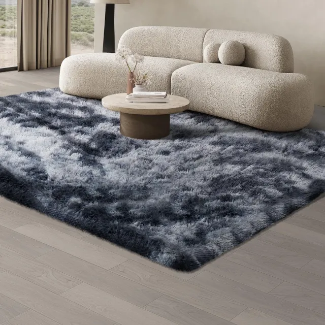 Unyqoos Donkergrijs hoogpolig vloerkleed met antislip en wasbare eigenschappen