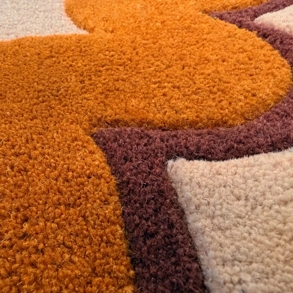 Flair Rugs Wiggle Border wollen loper oranje