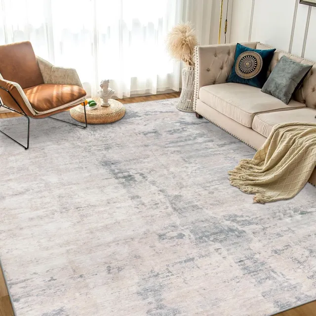 Unyqoos Wasbaar laagpolig tapijt in taupe met abstract ontwerp voor woon- en slaapkamer