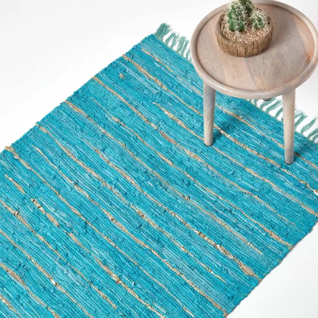 Homescapes Glitter leren vloerkleed turquoise-goud 120x180 cm, handgeweven vloerkleed van gerecycled leer Goud en turkoois
