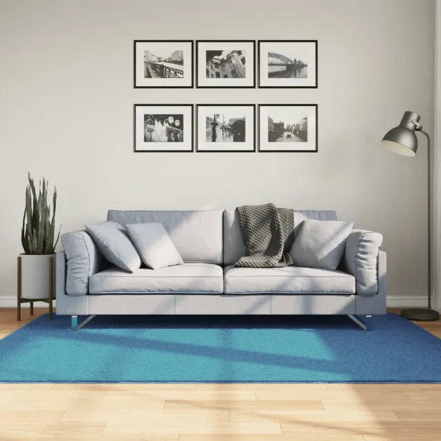 vidaXL Vloerkleed OVIEDO laagpolig 140x200 cm turquoise Blauw