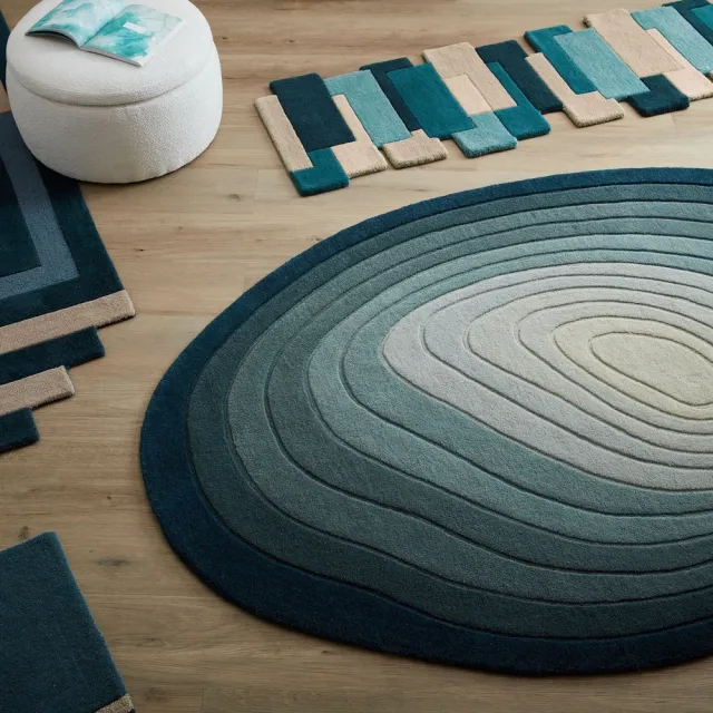 flycarpets Laagpolig Abstract Vloerkleed - Puddle Ombre Wool Ovaal - Blauw 200x290 cm